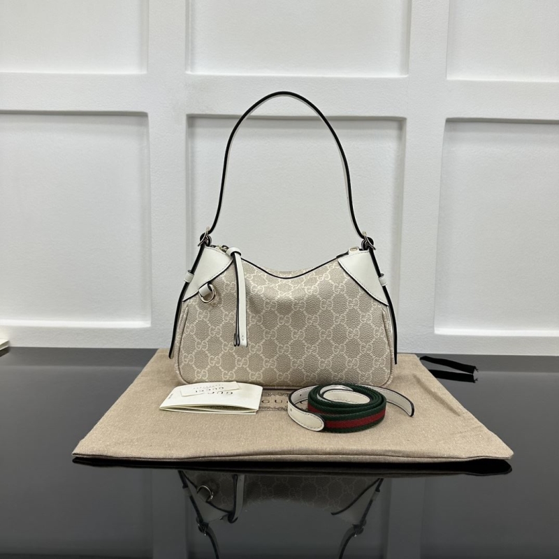G*u*i top handle bags
